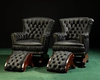 A pair of Victorian-style leather armchairs with footstools