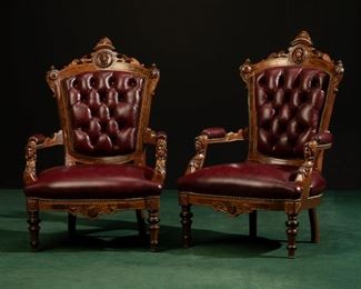 A pair of Victorian Renaissance Revival armchairs