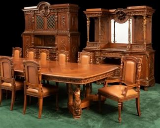 An Italian carved wood dining set