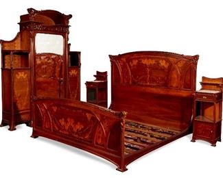 A Louis Majorelle-style French Art Nouveau bed set