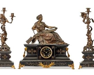 A Victorian-style mantel clock and garniture set