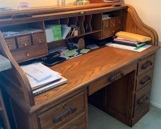 Large wood roll-top desk