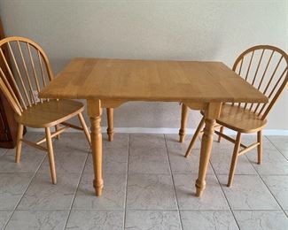 Perfect pine dinette set, drop leaf, and two chairs