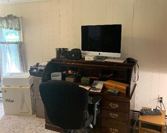 Family Room 
Roll top desk, Apple IMac computer, space heater