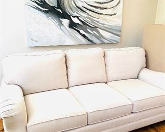 Like-new Bassett three-cushion sofa beige sofa