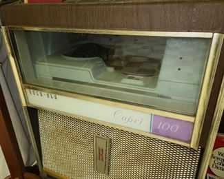 Vintage Rock-Ola Jukebox (Lights Up, Turns On, & Changes Disc)
