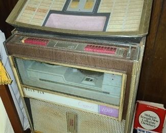 Vintage Rock-Ola Jukebox (Lights Up, Turns On, & Changes Disc)