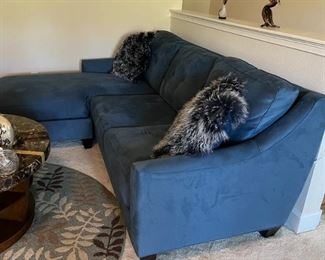 7’ sectional sofa w/reversible L-shaped chaise lounge. Color is midnight blue, fabric is microfiber. 