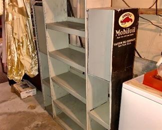 Antique Mobiloil service station oil can display cabinet. (Unfortunately most of the original labeling is underneath gray paint....with the right side remaining unpainted, as seen in the photo)  