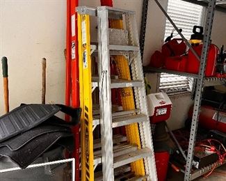 ladders gas cans, small cooler,funnel, air compressor,jumper cables, shop vac