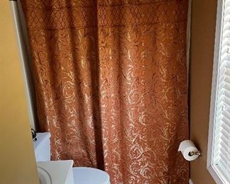 shower curtain, rings, rug