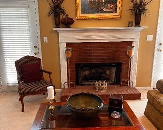 oil painting, pair floral arrangements, chair, pair candle holders, Thomasville coffee table,metal bowl