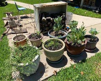 Assorted flower pots and Firewood container