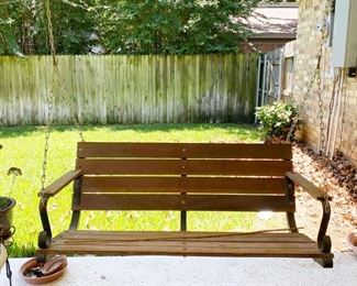 Hanging wooden patio bench