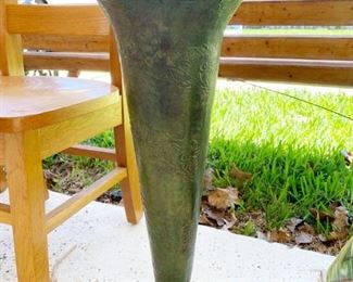 Green patina metal trumpet shaped flower vase