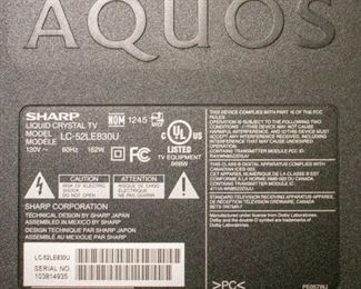 Sharp Aquos LCD TV. Model LC-52LE830U. No remote. Viewing and testing during sale hours is available upon request.