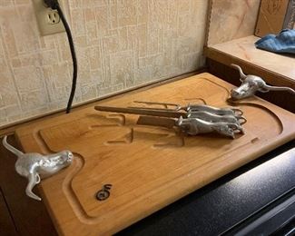 wood meat board with pewter handles and carving set