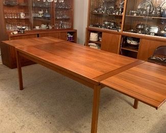 Danish modern table with side extensions, 5'4" long and almost 9' long with extensions, 3'3" wide