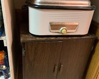 rolling cabinet and mid century roaster