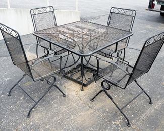 Metal Patio Set With Table And 4 Chairs, Table Is 29" H x 42" W x 42" D And Has Umbrella Hole, Chairs Can Rock