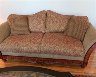 2 cushion  sofa   88"  x  38",  There  is  wood  trim.