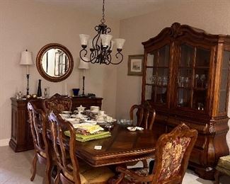 Ethan Allen dining table with 6 chairs 

Ethan Allen China cabinet 
