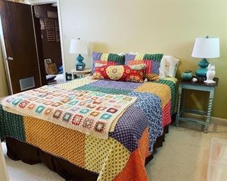 colorful bedding and afghan