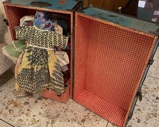 trunk full of beautiful vintage doll clothes