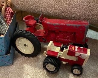 vintage red cast metal tractor
