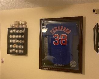 Zambrano Jersey in glass and wood case. Signed,  certified Tristar and MLB baseballs with cases. 