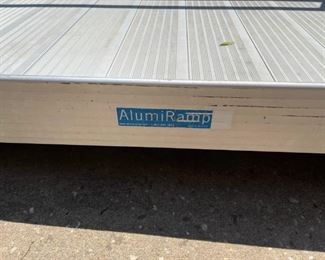 Alumiramp handicapped access ramp, aluminum and adjusts to height at point of entry. Presale priced at $ 600.00