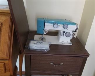 Vintage White Sewing machine and cabinet