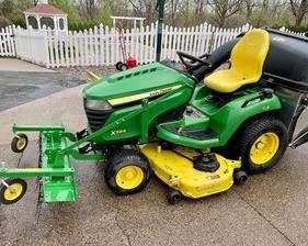 John Deere Lawn Tractor with Attachments in very good condition!  (120 hours)