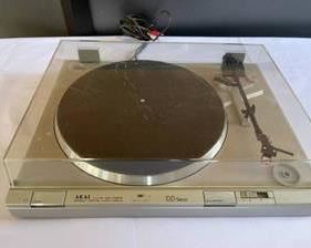 AKAI Direct Drive Turn Table Model AP-D210 in used condition with the dust cover having some scratches.