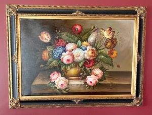 Beautifully Framed Still Life Painting designed with lovely colors and florals! Measures 31x43 inches