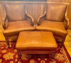 Lovely Leather Chairs and Matching Ottoman. The chairs in this grouping measure 35x30x39 inches. The ottoman measures 30x19x20 inches. a very classy set! These items are in very good condition. 