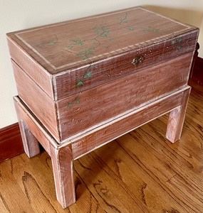 Decorative Trunk on a Stand measures 12x11x18.5 inches and is in very good condition.