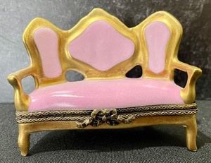 Limoges Pretty Pink Settee Pill Box- Trinket Box measuring 3 inches wide.