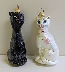 Christopher Radko Retired Black Cat Ornament and Christopher Radko Felinas Heart Breast Cancer Cat Ornament. Two lovely hand blown ornaments.

 There is some light glitter wear on the black cat. Both measure about 5.5” high and 2.5” wide.