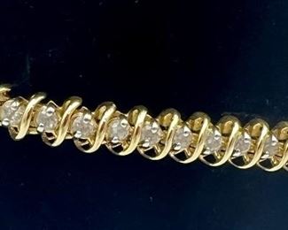 14k Four Carat Diamond Tennis Bracelet measuring 7” long 