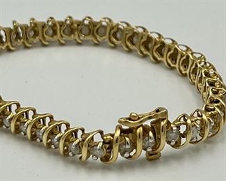 14k Four Carat Diamond Tennis Bracelet measuring 7” long 