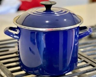 Blue Le Creuset Enamel Stockpot in good/used condition. Measures 9” w x 6.5” h 