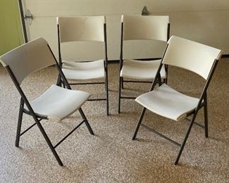 Four Folding Chairs by Lifetime 