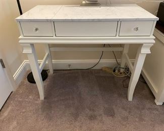 $75 White Desk w/faux Marble Top JR93-22                        A great piece with to add to any decor with its clean white finishes.                                                                                   
36"  x 18"  x 30"H
