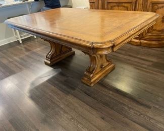 $400 - Thomasville Hills of Tuscany Bibbiano Table w/two 20" leafs JR93-14                                                                                                    
Sale includes one complete dining table and two leafs. Bibbiano is a famed hilltop estate near the Tuscan city of Siena. The region's reverence for hand craftsmanship can be seen in the mix of materials on the Bibbiano Trestle Dining Table. The decorative top blends olive ash burl, rustic pecan and a thin stripe of zebrawood inlay. Supporting the top are two deeply carved, scrolled wood pedestals
Sale includes dining table and two 20" leafs                              78" x 48" x 31"H w/o leafs
