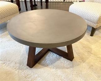 $150 - Gray Composit Round Coffee Table w/Faux Wood Cross Legs JR93-10                                                                     Great updated style and an excellent price.  Geometric legs for a modern yet timeless appeal                                          36" x 36" x 15"H