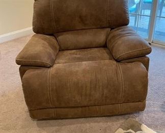 $150  Faux Suede Microfiber Oversized Reclining Chair  Brown JR93-3                                                                        While minimizing space requirements and sparing that "puffy" look you might expect from a recliner, this recliner doesn't hold back when it comes to contemporary style.                                                                      
45" x  40" x 37"H