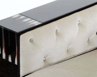 $2999Featuring the A&X Collections signature laser-cut crocodile textured pattern, the Bellagio loveseat is further enhanced with a glossy black lacquer finish. Faux cow horn inlay embellish the top corners of the loveseat. The cushions are constructed with a soft beige velour fabric and accented with black piping. Inner sides are tufted with crystals to complete this elegant creation. 
W68" x D37" x H24"
Excellent Condition   