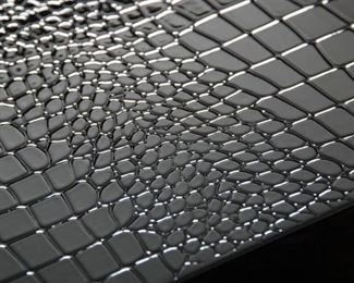 $2999Featuring the A&X Collections signature laser-cut crocodile textured pattern, the Bellagio loveseat is further enhanced with a glossy black lacquer finish. Faux cow horn inlay embellish the top corners of the loveseat. The cushions are constructed with a soft beige velour fabric and accented with black piping. Inner sides are tufted with crystals to complete this elegant creation. 
W68" x D37" x H24"
Excellent Condition   