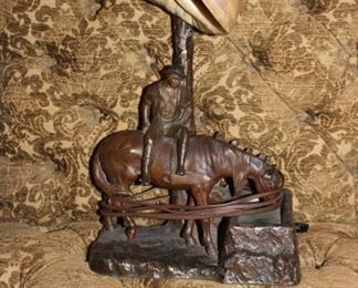 Antique bronze figural lamp with nautilus shell shade